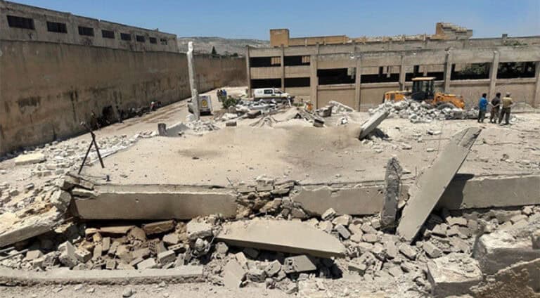 ئەنەکەسە کۆمکوژیا  ل جسر ئەل-شخوورێ شەرمەزار دکە و بانگا چارەسەریا سیاسی بۆ سووریێ دکە